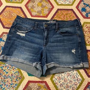 Stretch denim shorts with distressing